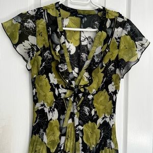 Green and black frilly top